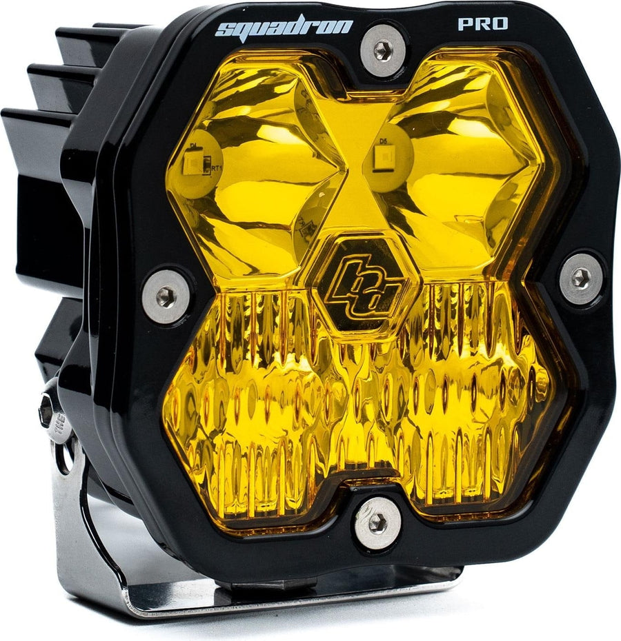 Squadron Light Pods by Baja Designs: A black Baja Designs Squadron Pro LED pod with an amber driving/combo lens on a white background.