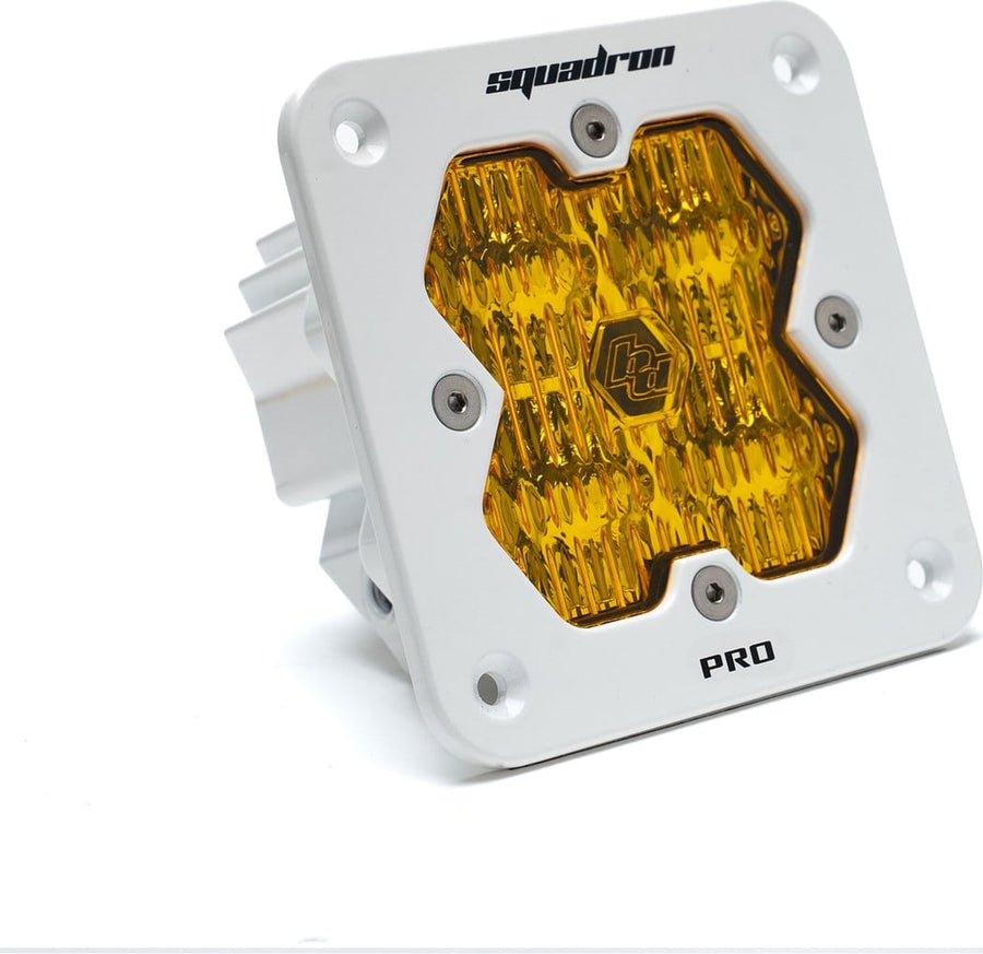 Mounts & Hardware by Baja Designs: A white Baja Designs Squadron Pro flush mount LED pod with an amber wide cornering lens on a white background.