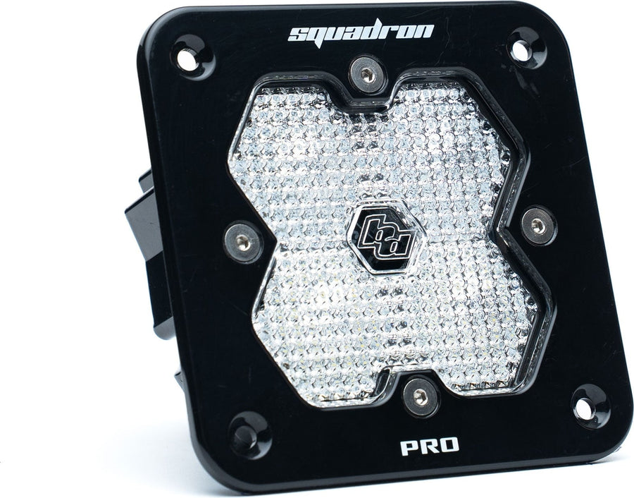 Mounts & Hardware by Baja Designs: Single black flush mount Squadron Pro pod with clear diffused work scene lens on white.