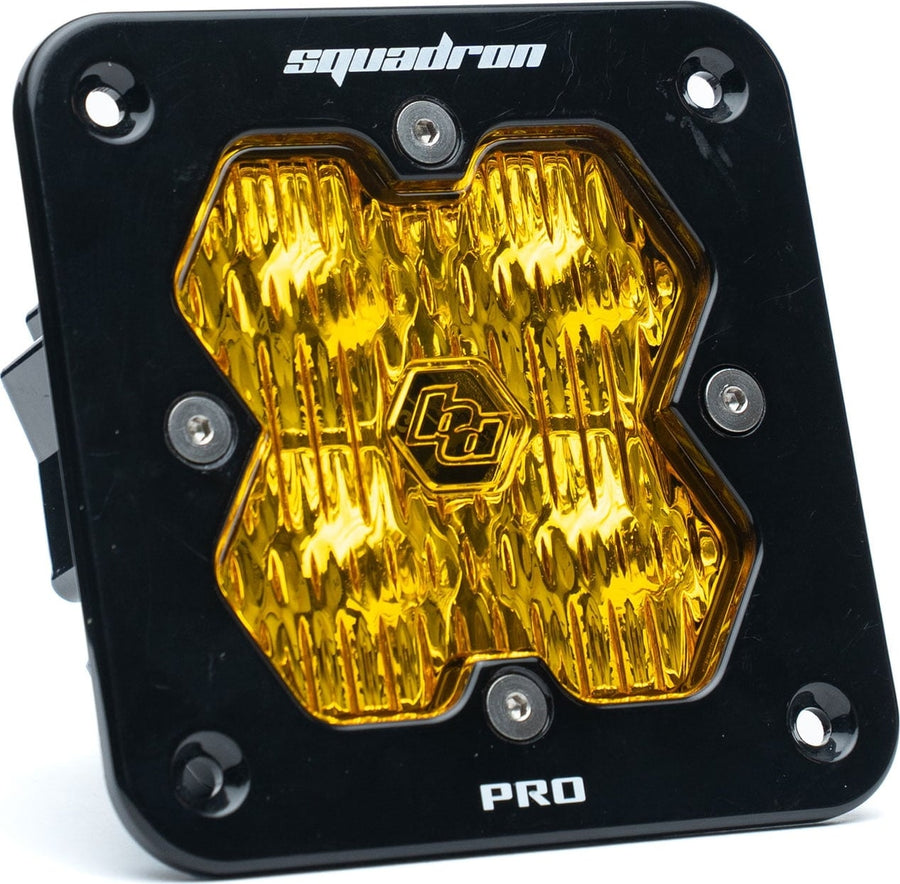 Mounts & Hardware by Baja Designs: Single black flush mount Squadron Pro pod with amber fluted wide cornering lens on white.