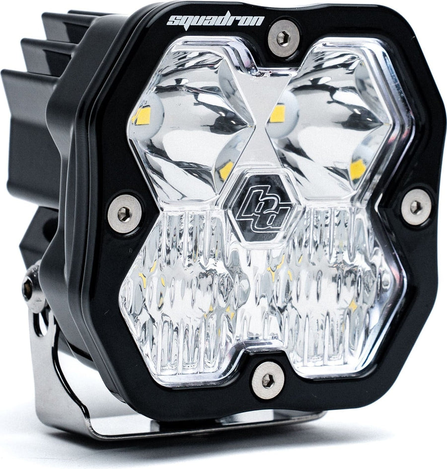 Squadron Light Pods by Baja Designs: Single black Squadron Sport pod with clear driving combo lens on its bracket, on white.
