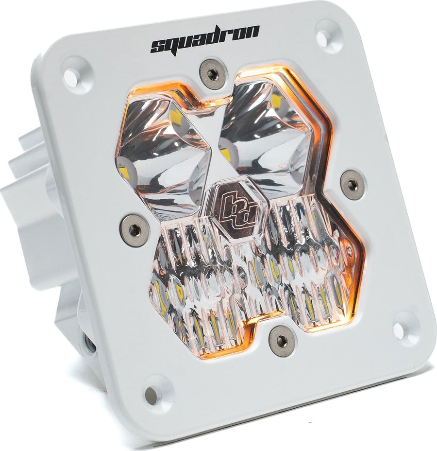 Mounts & Hardware by Baja Designs: Single white flush mount Squadron Sport pod with clear driving combo lens and amber backlight glow on white.