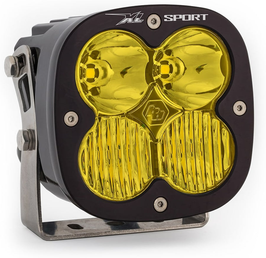 XL Light Pods by Baja Designs: A single black square Baja Designs XL Sport LED light pod with a amber driving/combo lens on a steel mounting bracket, shown on white.