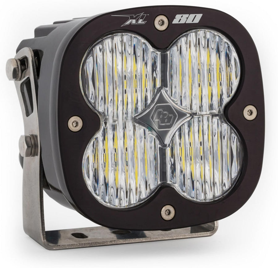 XL Light Pods by Baja Designs: A single black square Baja Designs XL80 LED light pod with a clear work/scene lens on a steel mounting bracket, shown on white.