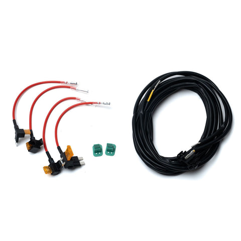Baja Designs Squadron 2.0 Pair Dual Deutsch Backlight Add-On Harness, whole product on a studio background: four red fuse tap leads, two green connectors and a coiled black harness laid out on white