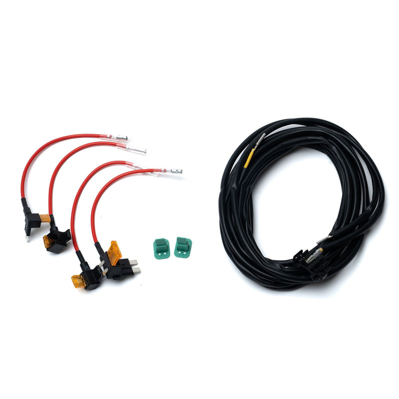 Baja Designs Squadron 2.0 Pair Dual Deutsch Backlight Add-On Harness, whole product on a studio background: four red fuse tap leads, two green connectors and a coiled black harness laid out on white