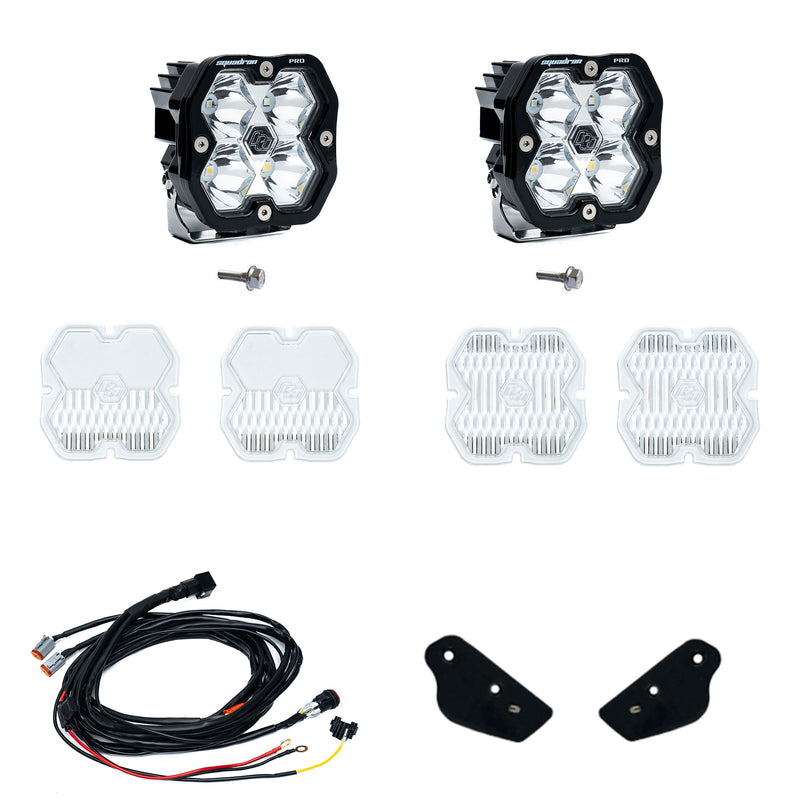 Baja Designs Squadron 2.0 Pro A-Pillar Light Kit, complete kit on a studio background: two Squadron Pro pods, mounting bolts, spare clear lens covers, a wiring harness