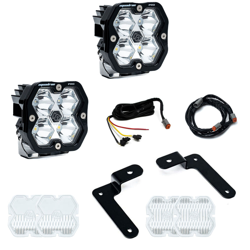 Baja Designs Squadron 2.0 Pro A-Pillar Light Kit, complete kit on a studio background: two Squadron Pro pods with black angled A-pillar brackets, two harness sections and spare clear lens covers on white
