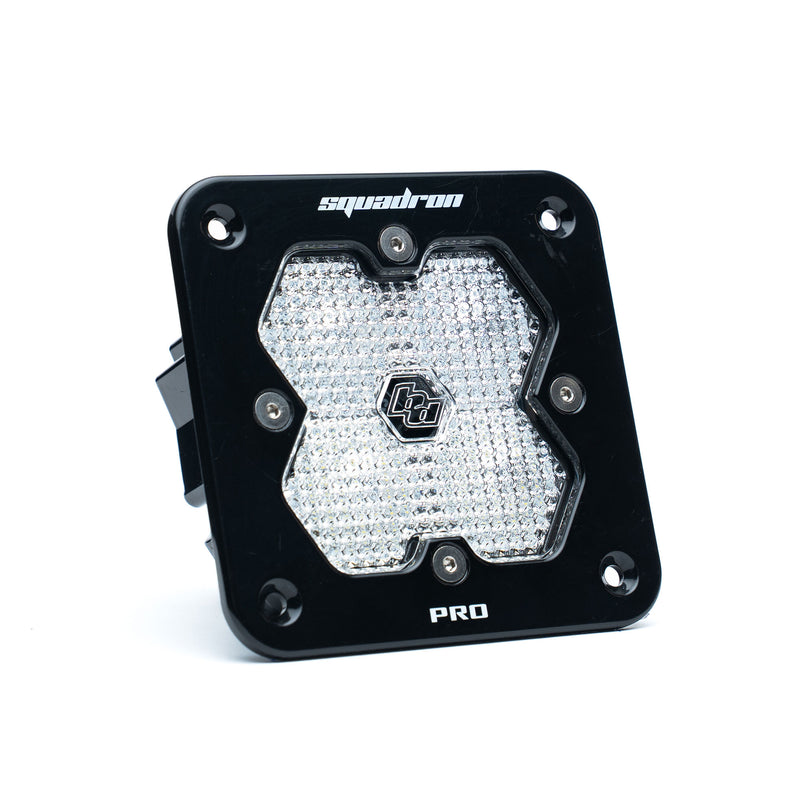 Baja Designs Squadron 2.0 Pro Black Flush Mount LED Auxiliary Light Pod, whole product on a studio background: single black flush mount Squadron Pro pod with clear diffused work scene lens on white