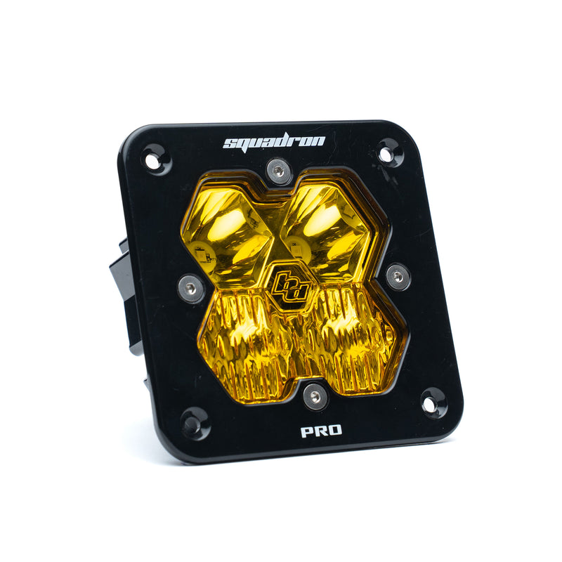 Baja Designs Squadron 2.0 Pro Black Flush Mount LED Auxiliary Light Pod, whole product on a studio background: single black flush mount Squadron Pro pod with amber driving combo lens on white