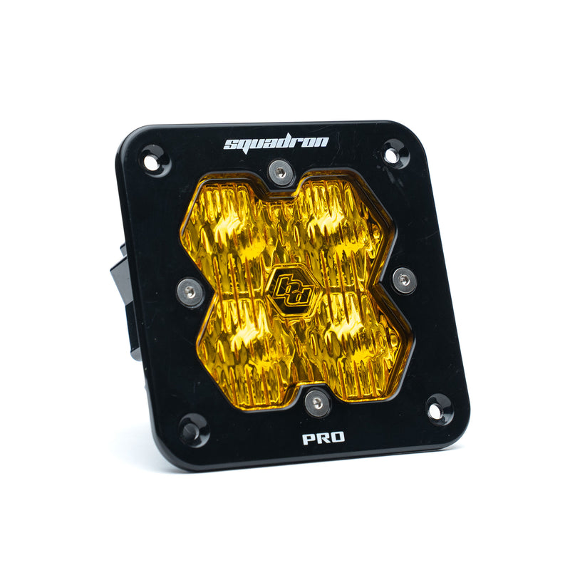 Baja Designs Squadron 2.0 Pro Black Flush Mount LED Auxiliary Light Pod, whole product on a studio background: single black flush mount Squadron Pro pod with amber fluted wide cornering lens on white