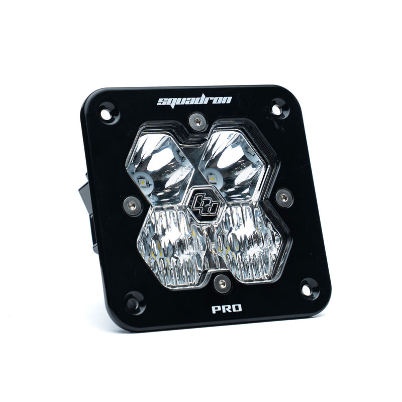Baja Designs Squadron 2.0 Pro Black Flush Mount LED Auxiliary Light Pod, whole product on a studio background: single black flush mount Squadron Pro pod with clear driving combo lens on white
