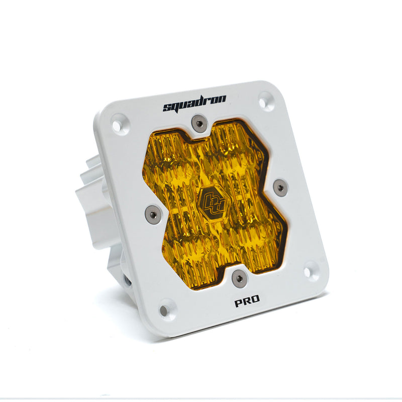 Baja Designs Squadron 2.0 Pro White Flush Mount LED Auxiliary Light Pod, whole product on a studio background: A white Baja Designs Squadron Pro flush mount LED pod with an amber wide cornering lens on a white background