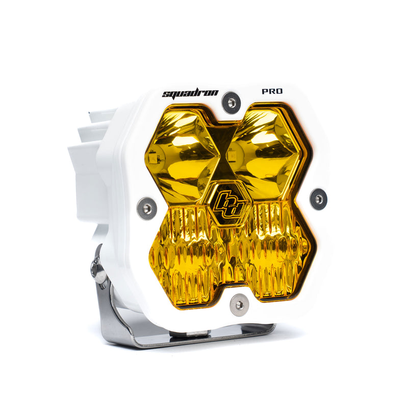 Baja Designs Squadron 2.0 Pro White LED Auxiliary Light Pod, whole product on a studio background: A white Baja Designs Squadron Pro LED pod with an amber driving/combo lens on a white background