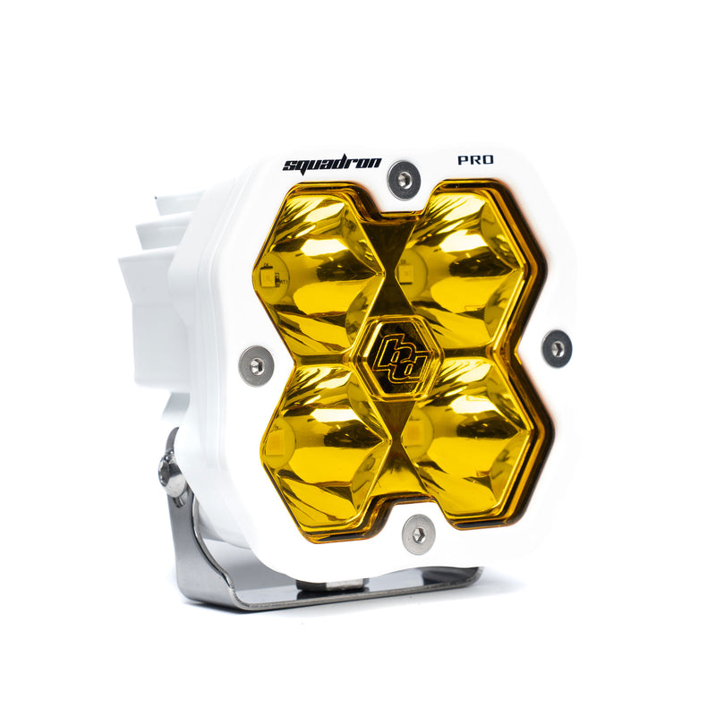 Baja Designs Squadron 2.0 Pro White LED Auxiliary Light Pod, whole product on a studio background: A white Baja Designs Squadron Pro LED pod with an amber spot lens on a white background