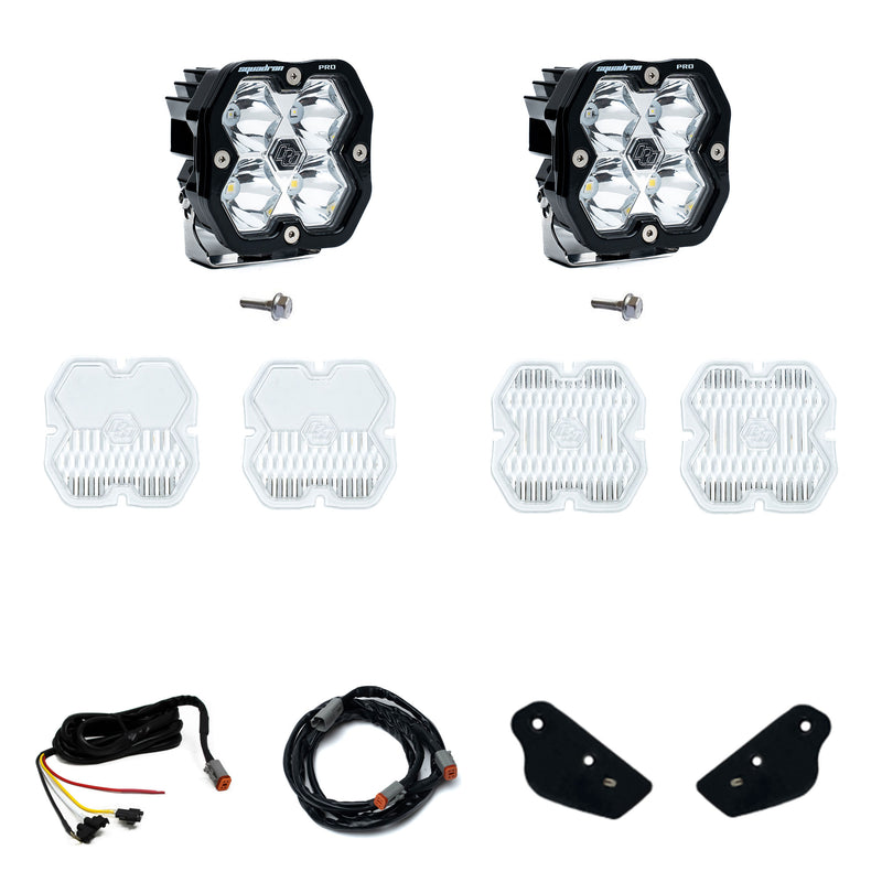 Baja Designs Squadron 2.0 Sport A-Pillar Light Kit, complete kit on a studio background: A Squadron Pro A-pillar kit with two pods, bolts, spare clear lens covers, harness sections and small black brackets on white
