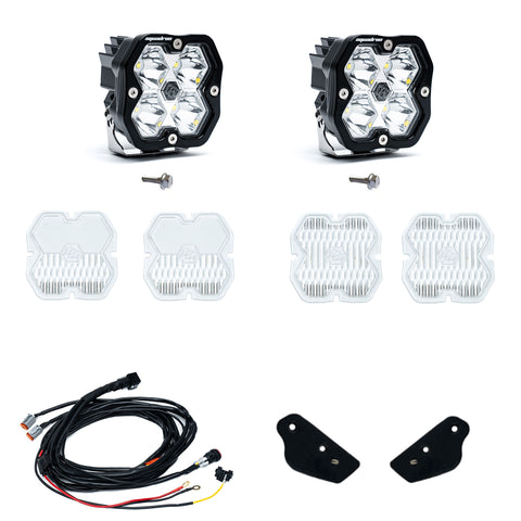Baja Designs Squadron 2.0 Sport A-Pillar Light Kit, complete kit on a studio background: two Squadron Pro pods, mounting bolts, spare clear lens covers, a wiring harness