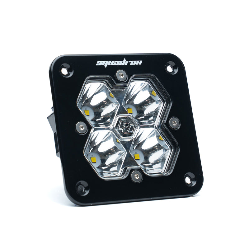 Baja Designs Squadron 2.0 Sport Black Flush Mount LED Auxiliary Light Pod, whole product on a studio background: single black flush mount Squadron Sport pod with clear spot lens on white