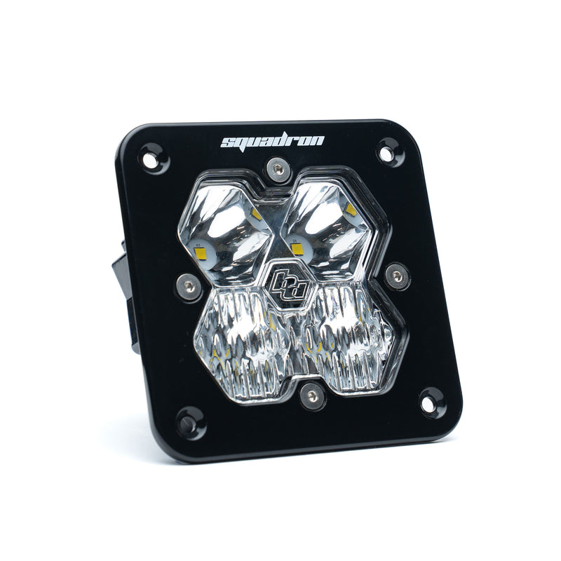 Baja Designs Squadron 2.0 Sport Black Flush Mount LED Auxiliary Light Pod, whole product on a studio background: single black flush mount Squadron Sport pod with clear driving combo lens on white