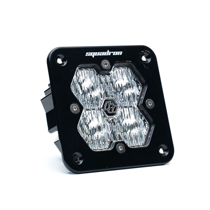 Baja Designs Squadron 2.0 Sport Black Flush Mount LED Auxiliary Light Pod, whole product on a studio background: single black flush mount Squadron Sport pod with clear fluted wide cornering lens on white