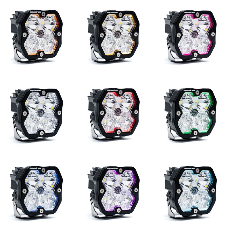 Baja Designs Squadron 2.0 Sport Black LED Auxiliary Light Pod Pair, whole product on a studio background: nine black Squadron LED pods arranged in a grid, each glowing with a different colored backlight