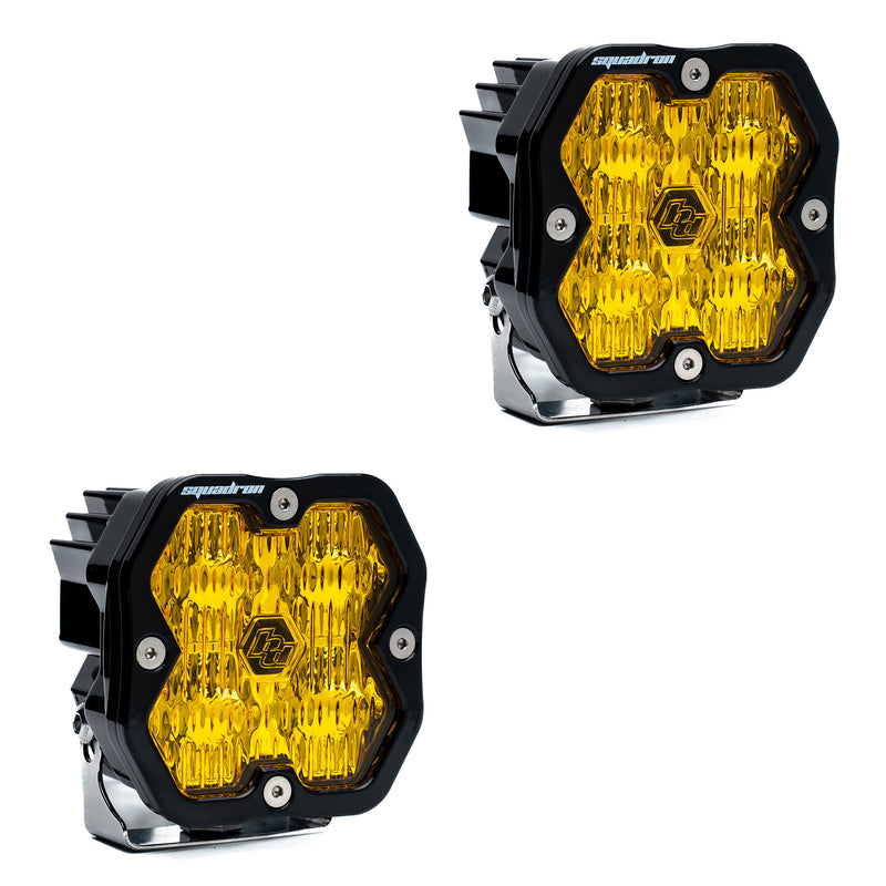Baja Designs Squadron 2.0 Sport Black LED Auxiliary Light Pod Pair, whole product on a studio background: pair of black Squadron Pro pods with amber driving combo lenses, no harness, on white