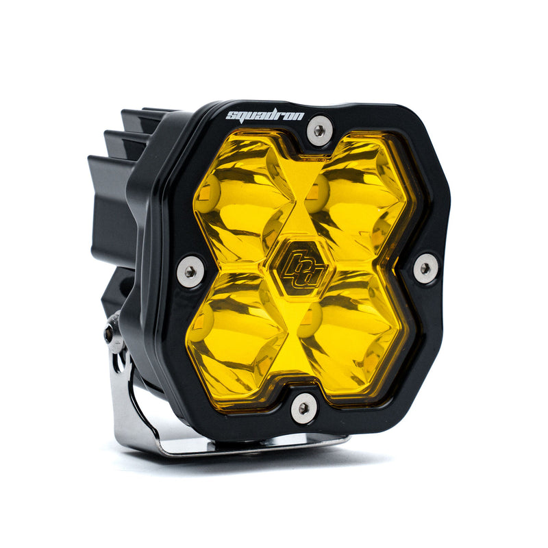 Baja Designs Squadron 2.0 Sport Black LED Auxiliary Light Pod, whole product on a studio background: single black Squadron Sport pod with amber spot lens on its bracket, on white
