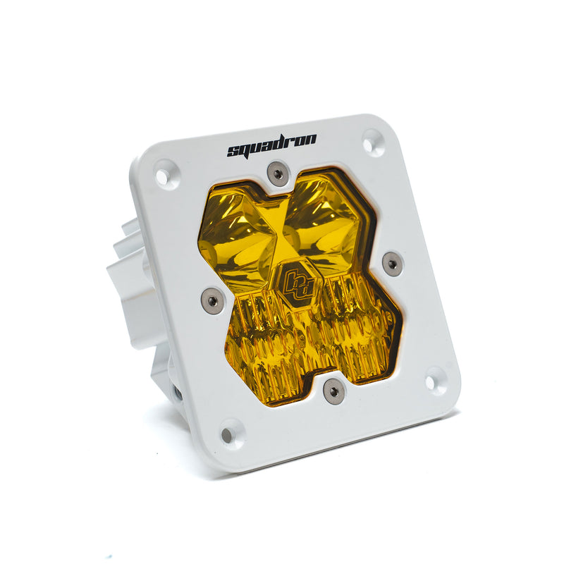Baja Designs Squadron 2.0 Sport White Flush Mount LED Auxiliary Light Pod, whole product on a studio background: A Squadron LED pod with an amber lens set in a white flush-mount housing on a white background