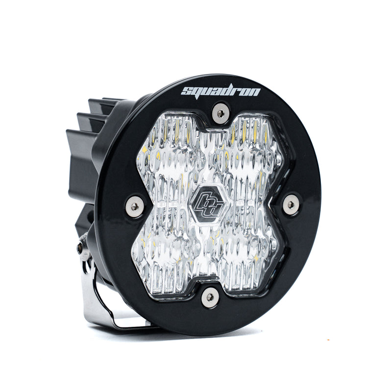Baja Designs Squadron-R 2.0 Sport Black LED Auxiliary Light Pod, whole product on a studio background: A round black Squadron-R LED pod with a clear fluted lens on a white background