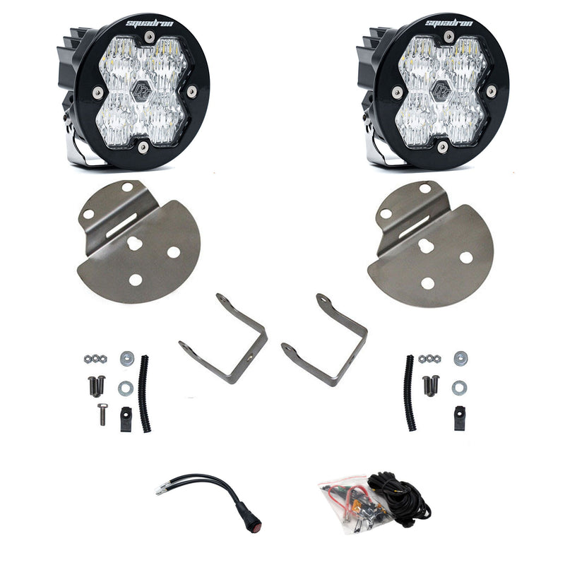 Baja Designs Squadron-R 2.0 Sport Fog Pocket Light Kit, complete kit on a studio background: pair of round Squadron-R pods with clear lenses, stainless round fog brackets, hardware and wiring harness on white