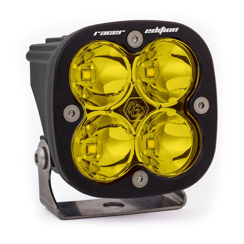 Baja Designs Squadron Racer Edition LED Auxiliary Light Pod, whole product on a studio background: A black Squadron Racer Edition pod with an amber lens on its mounting bracket. (Amber shown; part 720001 follows Baja's clear-lens numbering, amber