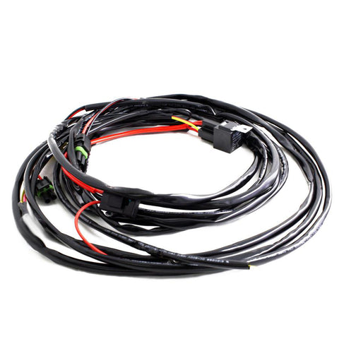 Baja Designs Squadron/S2/S1 2-Pin Hi-Beam 2-Light Max (150 Watts) Wiring Harness, whole product on a studio background: coiled black two-light wiring harness with relay, fuse holder, red lead and connectors on white
