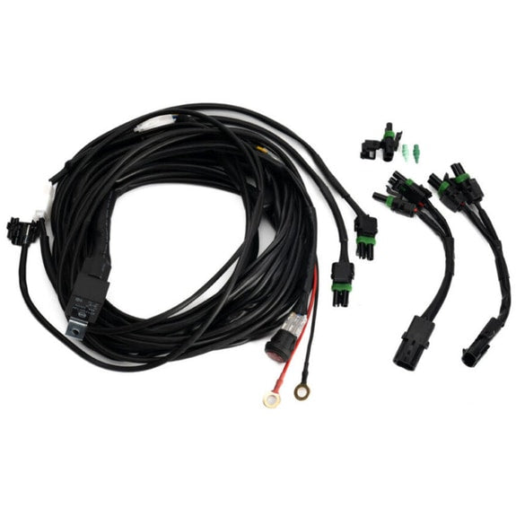 Baja Designs Squadron/S2/S1 3-Light Splitter, whole product on a studio background: black wiring harness with relay, switch, ring terminal and three connector pigtails on a white background