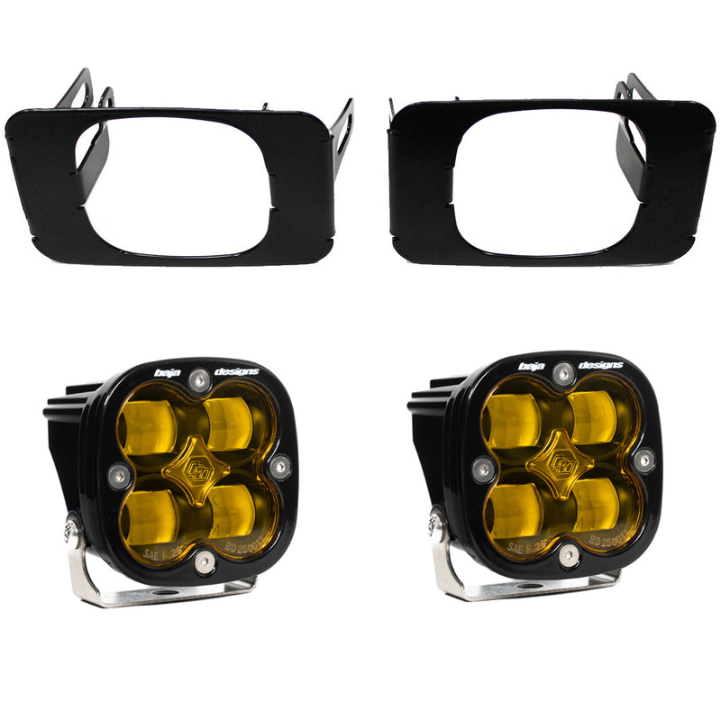 Baja Designs Squadron SAE Fog Pocket Light Kit, complete kit on a studio background: pair of black Squadron SAE fog pods with amber lenses and two black rectangular fog pocket brackets on white; sibling frames of this SKU show clear lenses, so lens