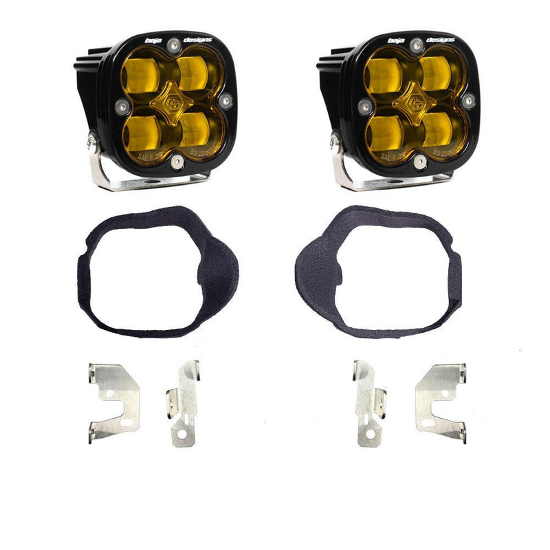 Baja Designs Squadron SAE Fog Pocket Light Kit, complete kit on a studio background: pair of black Squadron SAE pods with amber lenses, two black fog pocket gaskets and four steel brackets on white
