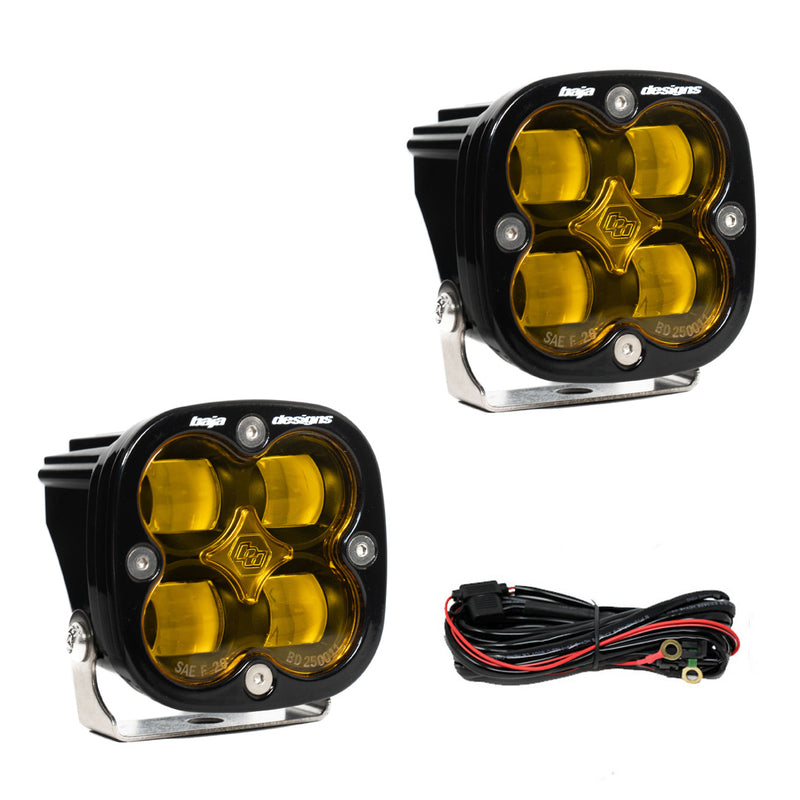 Baja Designs Squadron SAE LED Auxiliary Light Pod Pair, whole product on a studio background: two square black Squadron SAE pods with amber lenses and a wiring harness on a white background. (Amber shown; 25-7811 is the amber sibling, 25-7801 shows
