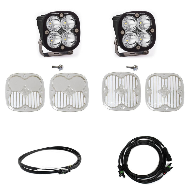 Baja Designs Squadron Sport A-Pillar Light Kit, complete kit on a studio background: two black Squadron Sport pods with clear lenses shown with mounting bolts, four clear lens covers and two wiring harnesses on white