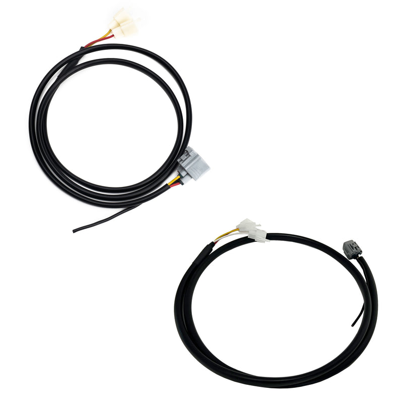 Baja Designs Upfitter Harness, whole product on a studio background: two coiled black upfitter wiring harnesses with gray and white connectors on white