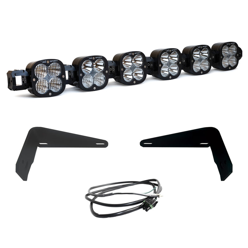 Baja Designs XL Linkable Bumper Light Kit, complete kit on a studio background: six XL linkable pods joined as one bar with two flat black bumper brackets and a thin wiring harness on white