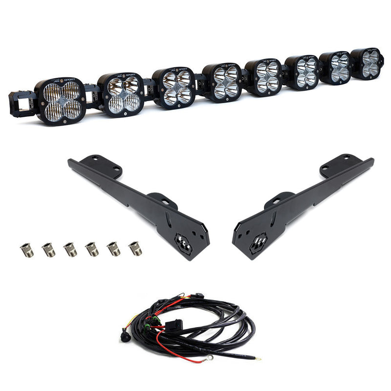 Baja Designs XL Linkable Light Bar Roof Kit, complete kit on a studio background: eight linked XL pods with two long black roof brackets, hardware and a relay harness on white