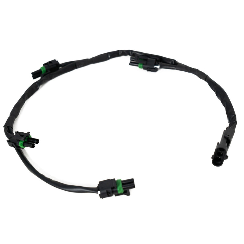 Baja Designs XL Linkable Wiring Harness, whole product on a studio background: A black linkable wiring harness with a main connector and several weatherproof light pigtails on a white background