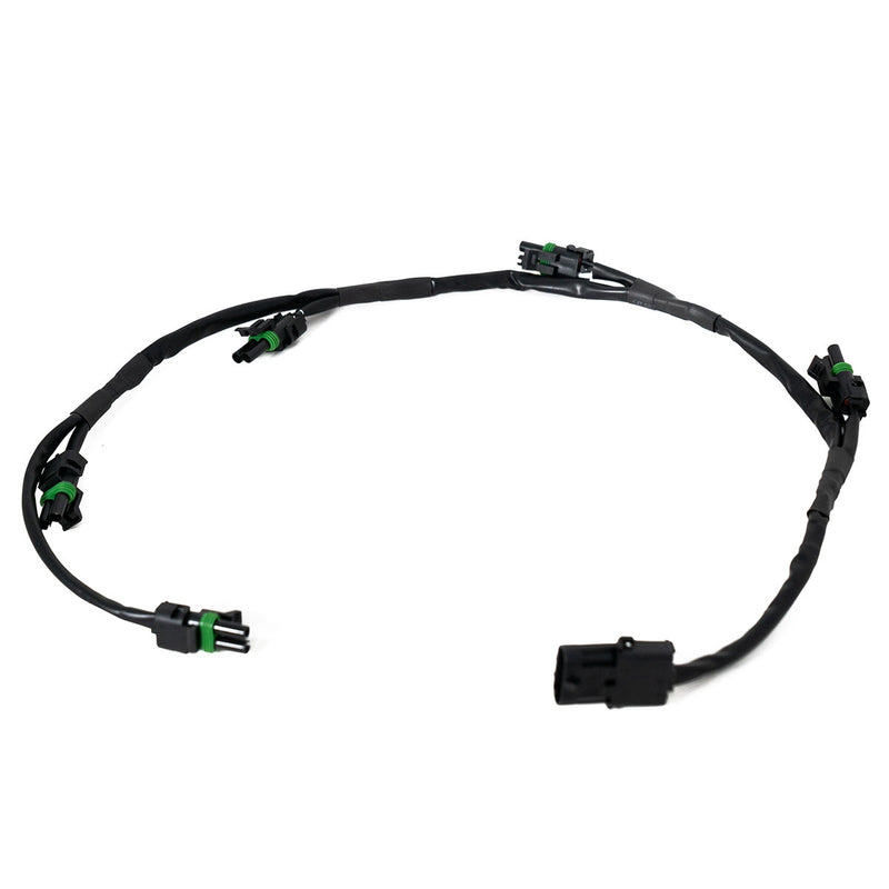 Baja Designs XL Linkable Wiring Harness, whole product on a studio background: A black linkable wiring harness with a main connector and several weatherproof light pigtails on a white background