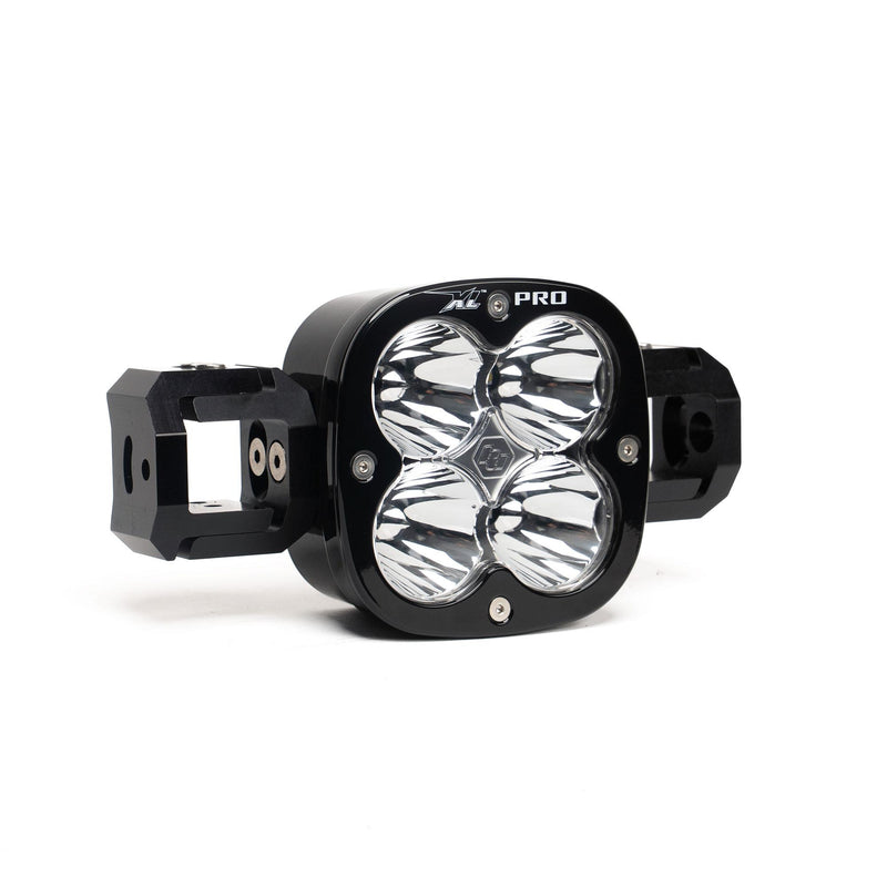 Baja Designs XL Pro Linkable Add-a-Light, whole product on a studio background: A single black XL Pro light pod with linking blocks on both sides and clear lenses on a white background
