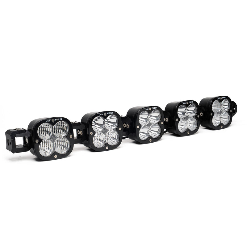 Baja Designs XL Pro Linkable LED Light Bar, whole product on a studio background: A five light XL Pro linkable bar with clear lenses and end mounts on white