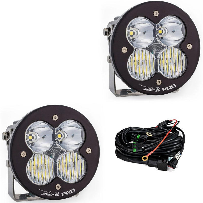 Baja Designs XL-R Pro LED Auxiliary Light Pod Pair, whole product on a studio background: A pair of black XL-R Pro LED light pods with clear driving/combo lenses on stainless brackets, shown with the wiring harness on a white background