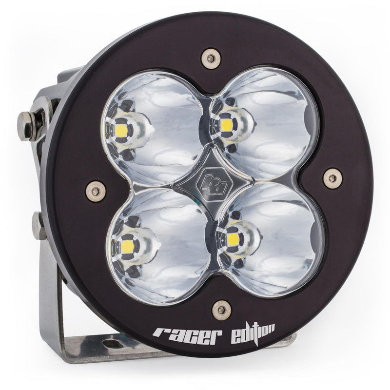 Baja Designs XL-R Racer Edition LED Auxiliary Light Pod, whole product on a studio background: A single black XL-R Racer Edition LED light pod