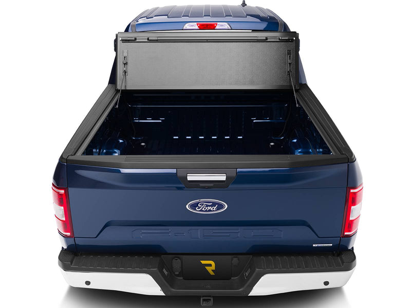 Rear view of the BAKFlip FiberMax folded up against the cab, bed fully open