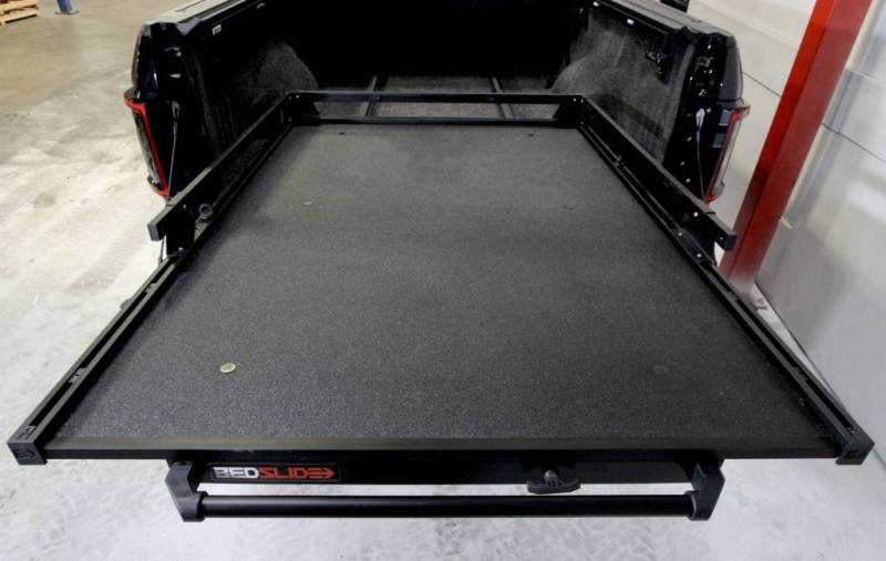 BEDSLIDE 1000 Classic cargo slide in Black Edition finish shown from above sitting in a pickup bed