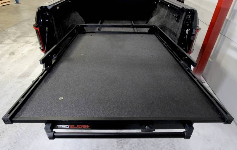 BEDSLIDE 1000 Classic cargo slide in Black Edition finish shown from above sitting in a pickup bed