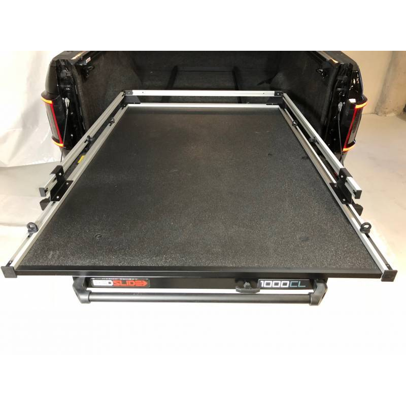 BEDSLIDE 1000 Classic cargo slide in Silver finish shown from above in a pickup bed with the 1000CL badge visible